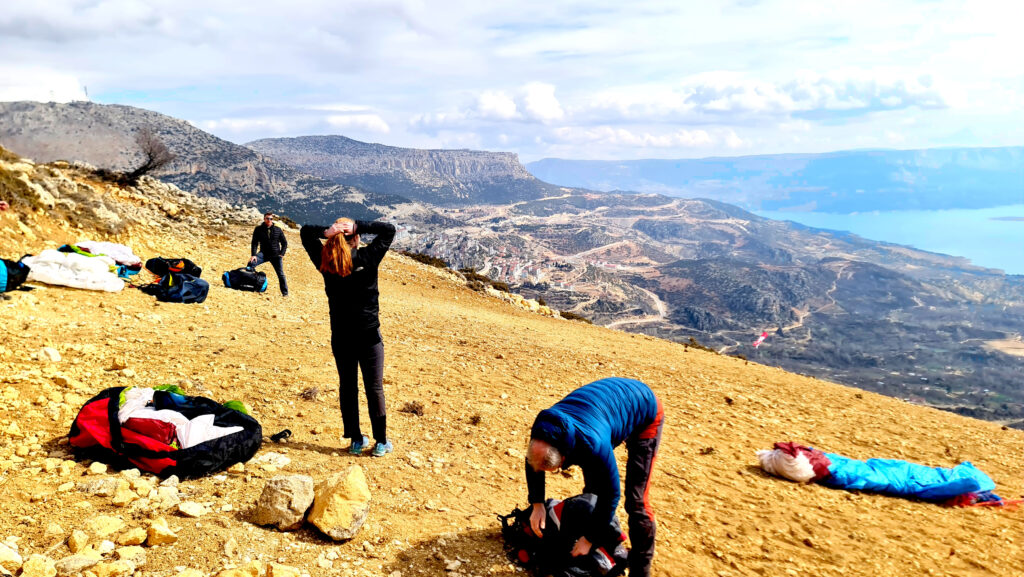 Pilots of Paragliding-Turkey are preparing for their flights up on kale take-off